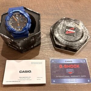 G-Shock Blue Resin Watch with Black and Orange Dial Accents
